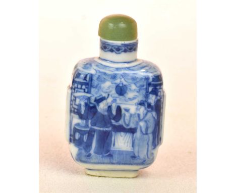 A Chinese porcelain blue and white snuff bottle, decorated with figures in an interior and with jade stopper, length 75mm.Con