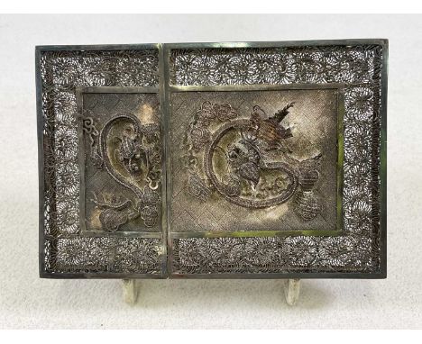 A Chinese white metal filigree card case, with raised decoration featuring a dragon, in original case bearing label to the in