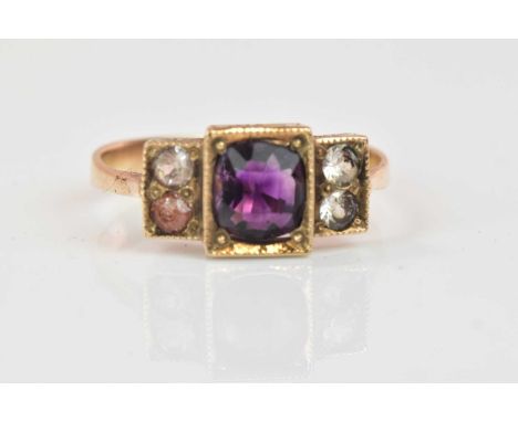 A yellow metal white sapphire and amethyst stepped dress ring, size N, approx 2.8g.