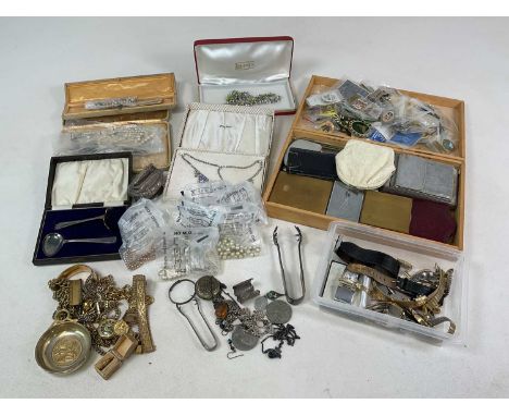 A group of costume jewellery including simulated pearls, gold plated items, also several fashion watches, a table lighter and