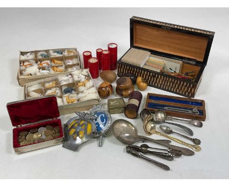 A quantity of collectors' items including Noah's Ark animals, porcupine quill box, playing cards, two car badges, a quantity 