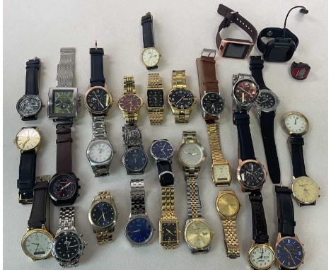 A very large collection of gentleman's fashion watches including Fossil, Rotary, Nixon, Accurist, etc (32).