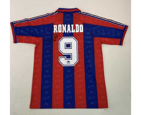 RONALDO (Brazilian footballer); a replica Barcelona football shirt signed by the former striker, size Large.