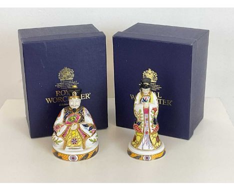 ROYAL WORCESTER; a pair of candle snuffers, 'Emperor' and 'Empress', both with puce printed marks and limited edition number 