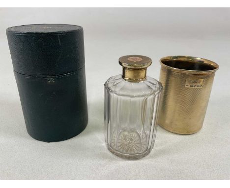 ARCHIBALD DOUGLAS; a leather cased George IV hallmarked silver gilt travelling beaker and bottle, both pieces engraved with t