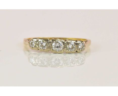 An 18ct yellow gold five stone graduated diamond ring with scroll setting, size K, approx 1.6g.