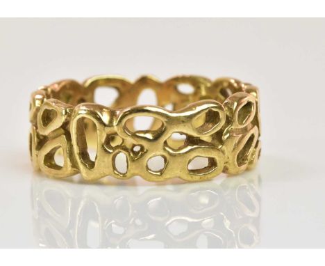 An unusual pierced 9ct yellow gold band ring, size W 1/2, approx 6.3g.