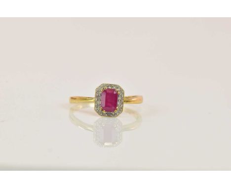 A 9ct yellow gold dress ring set with simulated ruby, size O, approx 1.4g.