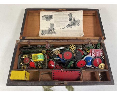Various pieces of vintage Meccano contained in a writing slope, with original boxes and leaflet.