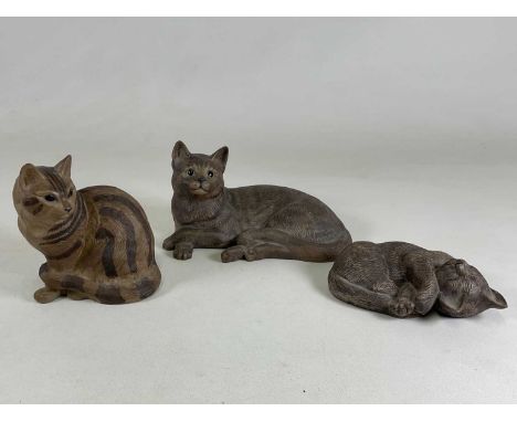 BARBARA LINLEY-ADAMS for POOLE POTTERY, three stoneware cats in various positions, largest height 18.5cm.