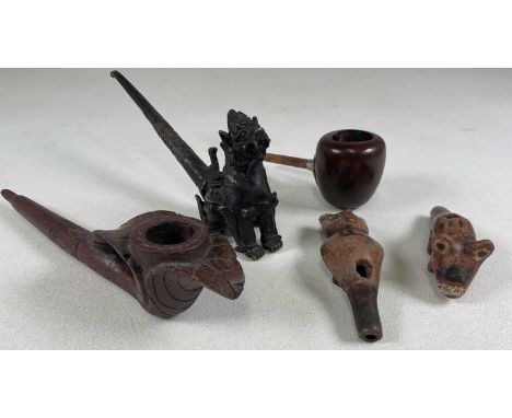 A polished pipe with simple mouthpiece, two further pipes and two zoomorphic ocarinas (5).Provenance: This forms part of a co