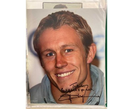 SPORTING HEROES; a green ring folder with approximately forty-one clear sleeves containing sporting heroes from tennis, boxin
