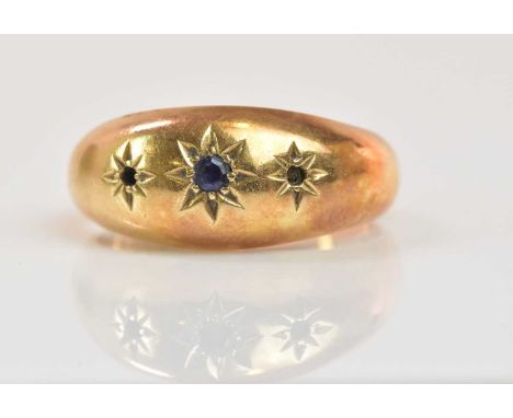 A 15ct yellow gold ring, originally set with three star cut framed stones (two now missing), size L, approx 3.15g.