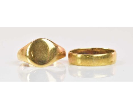 A 9ct yellow gold wedding band, size R 1/2, and a 9ct yellow gold signet ring, size T 1/2, combined approx 6.50g (2).