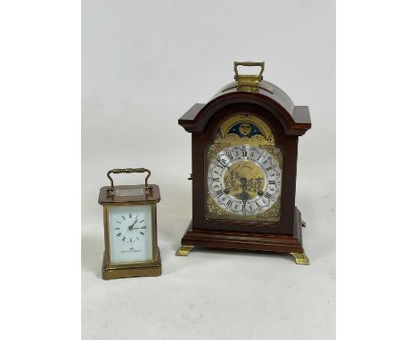 MATTHEW NORMAN; a Swiss made carriage clock, height 11cm, also a mantel clock, height 25cm (2).