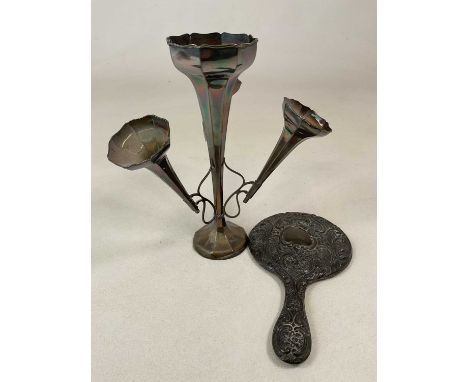 An early 20th century loaded hallmarked silver epergne, marks rubbed, and a silver backed hand mirror (2).