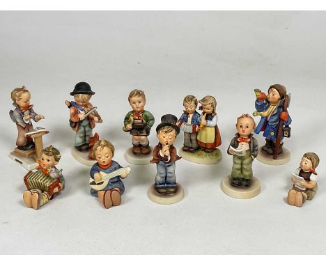 GOEBEL: ten ceramic figures all with different musical instruments or singing, largest height 13cm.