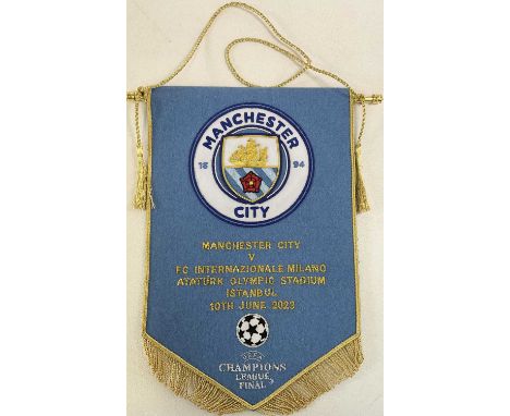 MANCHESTER CITY; a pennant from the UEFA Champions League Final 2023 vs Inter Milan.