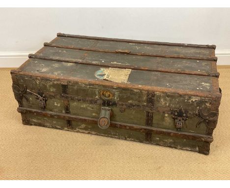 An early 20th century linen covered travel trunk with wooden banding, metal corners and lock, labelled 'UNION-CASTLE LINE', h