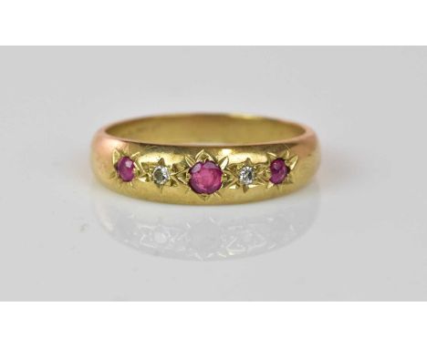 A 9ct yellow gold ruby and diamond five stone ring in the Victorian taste, size O, approx 3g.