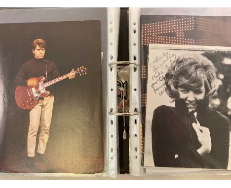 POP MUSIC; a black ring folder with fifty clear sleeves, each containing black and white and some colour photo images signed 