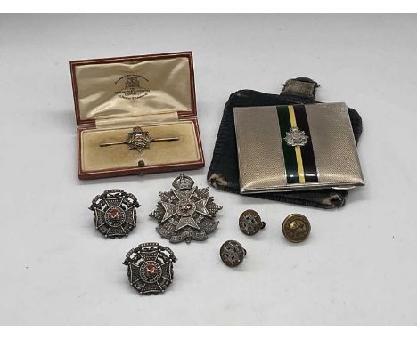 THE BORDER REGIMENT; a silver compact, cased yellow and white metal bar brooch, a further silver brooch, two silver badges, a