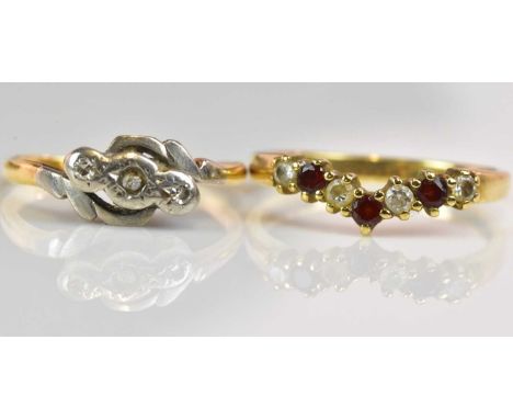An 18ct yellow gold platinum tipped ring, size I 1/2, approx 1.9g, and a 9ct yellow gold cubic zirconia set wishbone ring, si