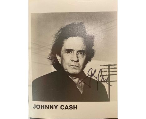 COUNTRY & POP MUSIC; a black ring folder with sixty-one clear pockets containing black and white and colour photo images and 