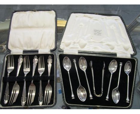 A cased set of six silver cake forks Sheffield 1925 and a cased set of seal topped coffee spoons and sugar tongs, Sheffield 1