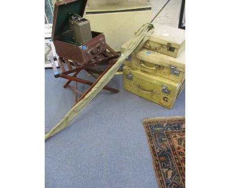 A mahogany folding and slat style luggage rack, a Victorian brass fire surround with pierced decoration, a Specto projector, 