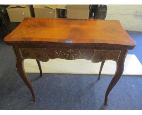 A modern Louis XV1 style kingwood and mahogany finished card table with metal mounts, on cabriole legs, 30 1/2"h x 33"w 