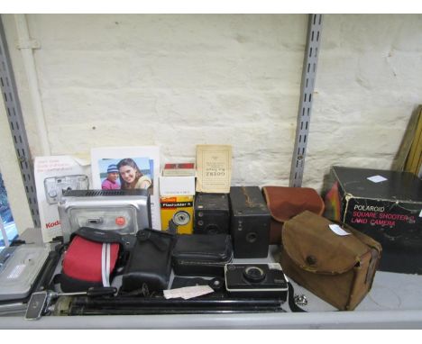 Vintage cameras to include Goerz Box Tanger, along with Brownie Kodak Junior and Shooter, and othersLocation LWM 