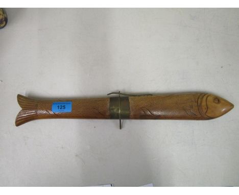 An Indian carved wooden carving knife and fork in the form of fish 