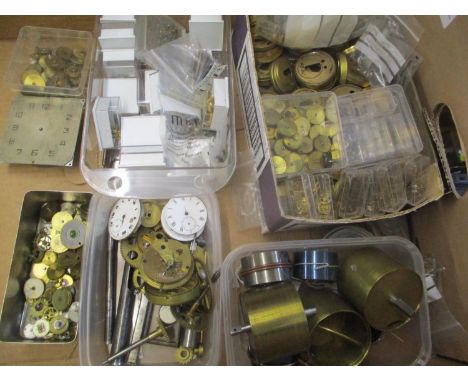A collection of clock and watch parts to include main springs, pocket watch movements, barrels and other items 