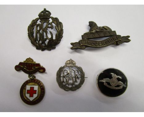 A silver and tortoiseshell Royal Flying Corps sweetheart brooch, an RAF sweetheart brooch made from a coin and two cap badges