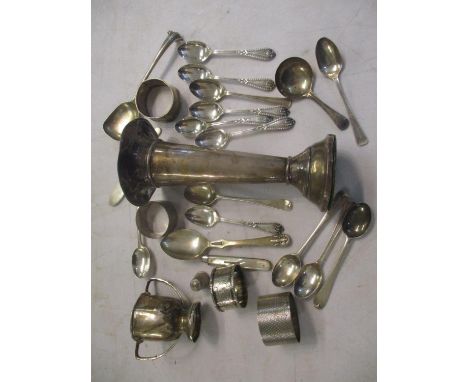 Mixed silver to include a vase, small trophy, napkin rings, spoons and other items 