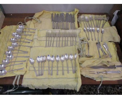 An American set of silver plated cutlery and flatware, comprising a twelve place setting to include a carving set 