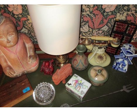 A red resin Buddha, Crown Staffordshire, a Betacom vintage telephone, a brass lamp and other items 