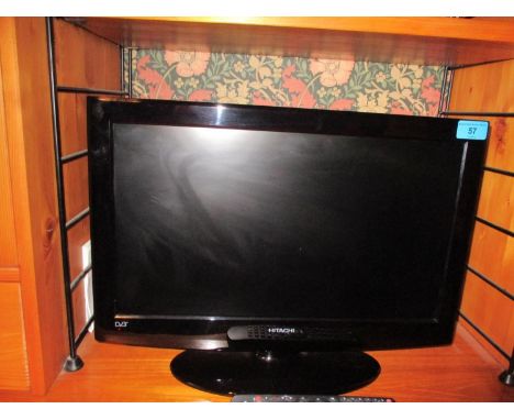 An Hitachi flat screen 18" television with remote 