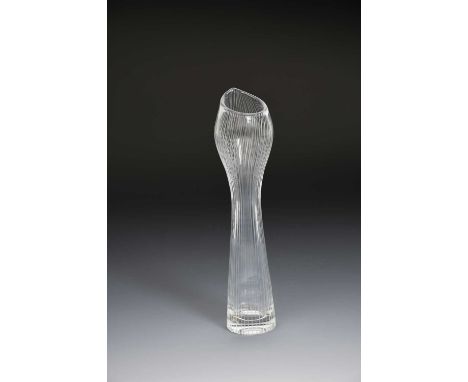 An Iittala glass vase designed by Tapio Wirkkala, slender, swollen cylindrical form with vertical cut lines etched Tapio Wirk