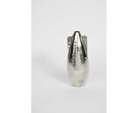 Jean Després (1889-1980)a Modernist pewter vase, bombe shaped with three fins, hammered finish,etched Després22cm. high 