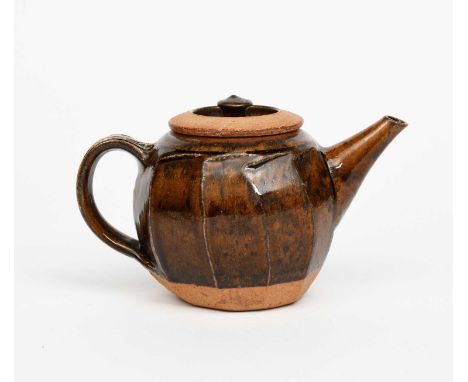 Φ Richard Batterham (1936-2021)a cut sided stoneware teapot and cover, covered in a manganese glaze to the bodyunsigned14.5cm