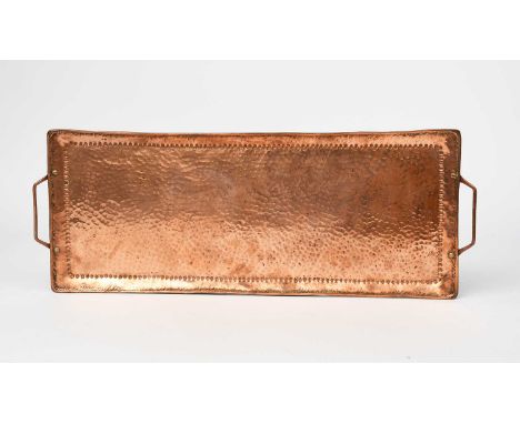 A John Pearson copper twin-handled tray, rounded rectangular section with hammered finish, applied twin-handles, a Hugh Walli