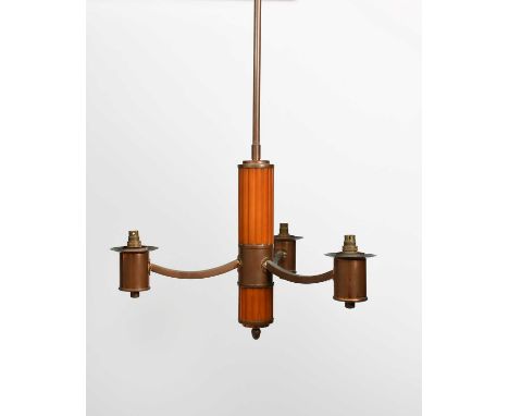 An Art Deco bakelite and copper three light electric ceiling light, the tapering, fluted bakelite stem supporting three radia