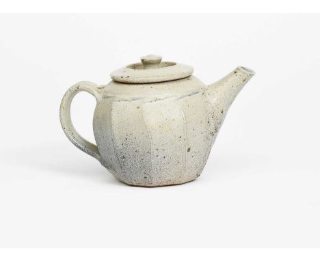 Richard Batterham (1936-2021)a salt-glaze stoneware cut-sided teapot and cover, covered in a pale blue-grey glaze with drips,