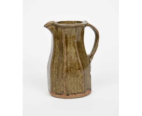 Jim Malone (born 1946)an Ainstable Pottery cut-sided stoneware jug, covered in an ash glazeimpressed seal marks22cm. high 