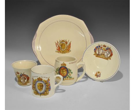 1937. A mixed group of white- and cream-glazed ceramics comprising: a mug with portrait within a garter with 'Honi Soit Qui M