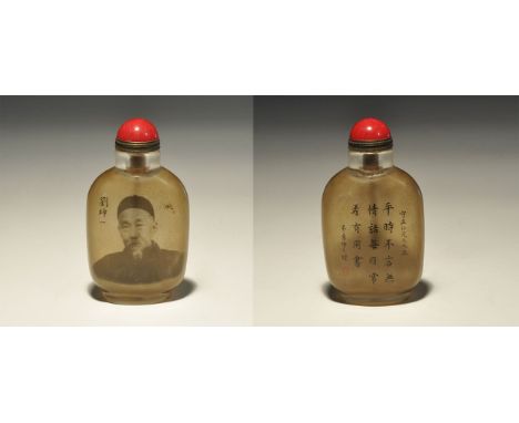 20th century AD. A glass snuff bottle with sepia portrait and blocks of calligraphic text; supplied in a silk-lined case. 108