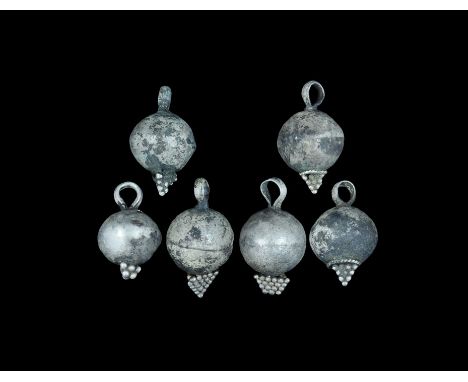 9th-11th century AD. A group of six silver pendants each a hollow sphere with attachment loop and pyramid of granules. Cf. Se