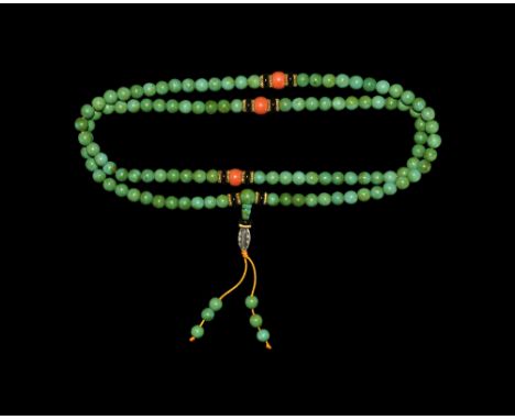 20th century AD. A necklace of spherical faux-jade beads with three dyed coral beads, black glass discs and granulated collar